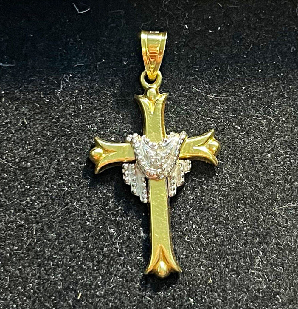 14k Yellow Gold cross pendant 1.56 grams. Marked and acid tested